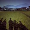 The silhouette of mountains around us at night