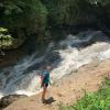 Hiking by a waterfall