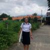 In my school uniform in Thailand, where all students wear uniforms