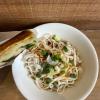 Homemade spicy noodles with an onion cake