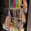 Waist beads, which many Ghanaian women wear for cultural reasons, dangle from wooden shelves
