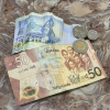 I also make sure I have enough of Ghana's currency, the "cedi" (pron.: seedy), which pays for groceries and transportation
