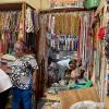 In Makola Market, a vendor named Nii sells beads, which Ghanaians of all ages - including babies! - wear around their waists, arms, legs, and necks. Nii said that Ghanaians put heavy beads on their babies so they can grow strong limbs.