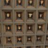 This is the ceiling of one of the rooms in Wawel castle; it has wooden carvings depicting a variety of people from kings to peasants