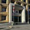 Basking in the sun during the cold winter while guarding a government building
