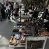 This table had all sorts of tools, knives, and even swords, for sale!