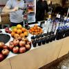 Freshly-squeezed pomegranate juice in a large indoor market