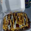 Yaroa is my favorite Dominican street food -- french fries covered in ketchup, mustard, mayo, and ground chicken!
