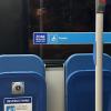 The handicap signs are both in French, and only one has English text; the red button that you push to indicate that you want to stop says "Arrêt"