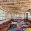 The rooftop salon atay (tea salon) of a hotel in Imlil, which is a place where one can sip and dance