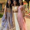 Here's another picture of me with some of my cousins at the wedding! We are all wearing traditional Indian clothing called lehengas
