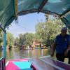 A view from the boat ride in Xochimilco. This is our guide Axel rowing the boat.