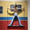 "Man Clinging to Train"