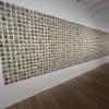 "Parede de Memoria" by Rosana Paulino, a detailed collection of photos of African people printed on cloth inspired by photos of her ancestors