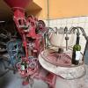 A vintage wine bottle filling machine