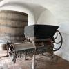 Old equipment, wine barrels, and food storage at the Jesuit estate