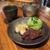 This Japanese tea and dessert plate has matcha ice cream, sweet red beans and mochi balls