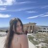 Here I am showing off the tattoo that I got in Valencia in March in front of the Acropolis!