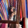 A Moroccan scarf salesman pulled us into his shop to talk about the materials and colors of his walls of scarves
