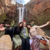 We went on a short boat ride underneath the waterfall in Morocco, and the driver took our photos for us