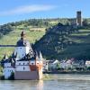 Tom: Pfalzgrafrenstein Castle in the Rhine River with Burg Gutenfels Castle in the background