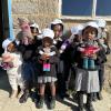 A mixed pre-kindergarten class with their new bears