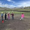 Some of my students playing soccer, with cones I lent them