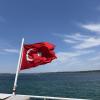 A Turkish Flag on the ferry used to sail across the water to visit the city center of Çanakkale