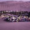 Huacachina oasis at sunset from the top of one of the dunes.
