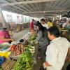 Perusing the local market at lunchtime with my coworkers; I love to snack on fast food when I am too lazy to cook, but I mostly love to pick at food I get locally!