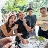 Me and my Peace Corps friends posing with raw pork filling for our dynamite (a popular street food in the Philippines); Although it's not traditional "fast food," dynamite and other snacks are a great alternative!