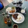 Enjoying fried chicken and chicken inasal, a delicious grilled chicken dish