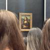 A quick photo of the Mona Lisa in Paris. 