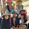 This is me with the other ETAs after we painted our rice paddy hats 