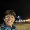 A picture of of me in the Barceloneta beach, in Barcelona Spain, at night.