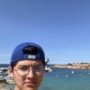 This is a picture of me with the Mallorca, Spain beach in the background. 