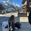 My friend petting a dog in the ski town Chamonix, France