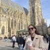 Eating Kaiserschmarrn, a traditional Austrian dessert, in front of St. Stephen's Cathedral in Vienna, Austria