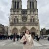 Here I am in front of the newly-restored Notre Dame Cathedral in Paris, France