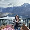 Very joyful at a cafe on top of a mountain in Hallstatt, Austria