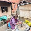 The first village we stayed in was this women's house. She was grinding up her dinner for the night!