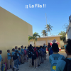 All the students line up for morning prayer, the national anthem, and announcements