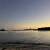 One morning I got up early to paddle waka ama in Ōkahu Bay. The sunrise was beautiful! You can see the island Rangitoto in the background.