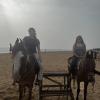 Shreya (left) and Jahnavi (right) on horses