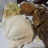 Fried fish, nshima, and veggies. 