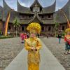 This is me in a traditional Minangkabau wedding outfit!