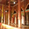 The inside of Pagaruyung Palace is all wood, with colorful fabrics on the walls