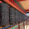 Prayer wheels lining the temple. People spin them clockwise during prayer. 