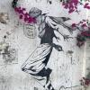 Murals in Amman effortlessly flow with the city's sidewalks and flora 