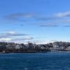 This is a view of mountains on the morning boat trip around Santander Bay